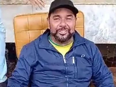 Fábio Alexandre de Oliveira sentado na cadeira do acervo do STF.