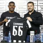 Feliz, Cuiabano é apresentado no Botafogo: 'Me sinto melhor como lateral'