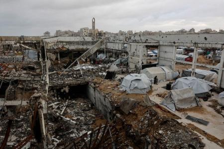 Imagem aérea mostra destroços de edifícios na Faixa de Gaza