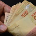 Super quarta vem aí: juros devem subir no Brasil e cair nos EUA