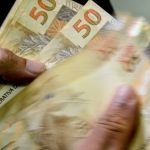 Crédito consignado do Auxílio Brasil é suspenso; entenda