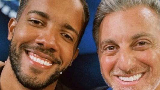 Arthur de Oliveira Abrantes e Luciano Huck
