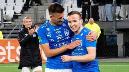 Atacante artilheiro da Champions League (esq)
