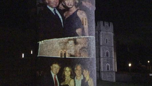 TOPSHOT - This frame grab made on September 17, 2025 from an AFP video footage dated from September 16, 2025 shows pictures projected onto a tower of the Windsor Castle bearing (bottom) notorious sex offender Jeffrey Epstein with Ghislaine Maxwell and US President Donald Trump (L) with Melania Trump, during an action by activists from the British group Led by Donkeys on the sidelines of Trump's state visit to Britain. The photograph (top) shows Trump posing with Belgian model Ingrid Seynhaeve, with Epstein in the background. Activists from the British group Led by Donkeys holds politicians to account through often humorous campaigns. (Photo by Lena VOELK / AFP)