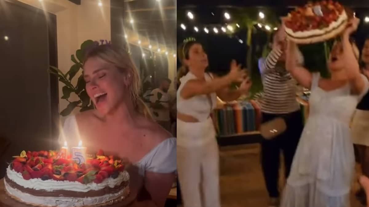 Carolina Dieckmann empolga com parabéns e derruba bolo de aniversário no chão; veja