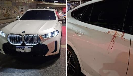 As vítimas estavam em uma BMW. O motorista teria perdido o controle da direção, invadiu a pista do Move e capotou.
