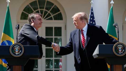 O ex-presidente Jair Bolsonaro (esq.) e o presidente dos Estados Unidos, Donald Trump (dir.), em 2019