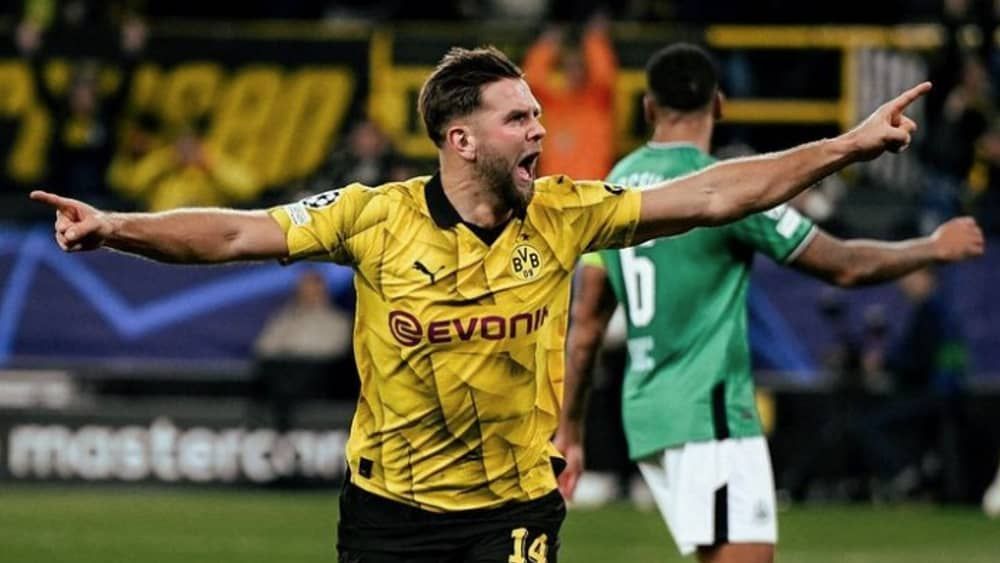 Borussia Dortmund vence Newcastle e embola 'grupo da morte' da Champions