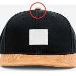 Qual é a função do botão na parte superior dos bonés? Poucos sabem!