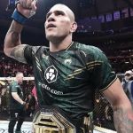 Em combate histórico, brasileiro conquista título do UFC