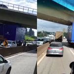 Vídeo: carreta com carga excedente 'entala' em viaduto na Rodovia Fernão Dias em Contagem