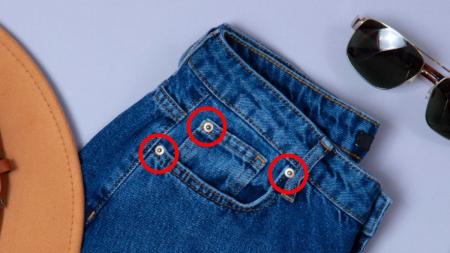 Mais que estilo: a função escondida dos botões de metal nas calças jeans