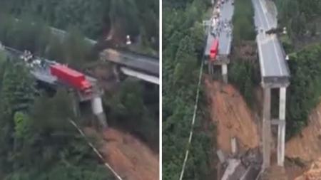 Caminhão ficou com a cabine suspensa após queda de ponte