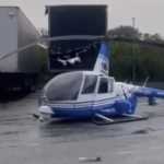 Helicóptero da TV Band faz pouso de emergência na Via Dutra, em São Paulo