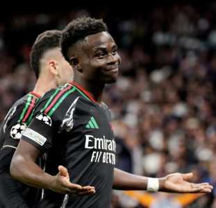 Saka, do Arsenal, comemora gol marcado diante do Real Madrid na Champions League