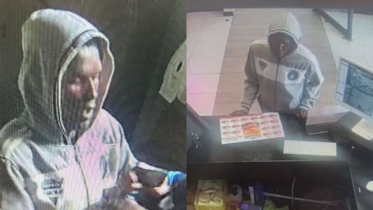 Suspeito com blusa de capuz simulou estar armado