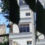 Vídeo mostra mulher limpando janela do 6º andar pelo lado de fora em BH