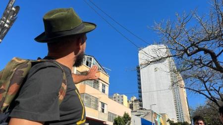 Eduardo Kobra mostra marcações sendo feitas em paredão que terá sua assinatura