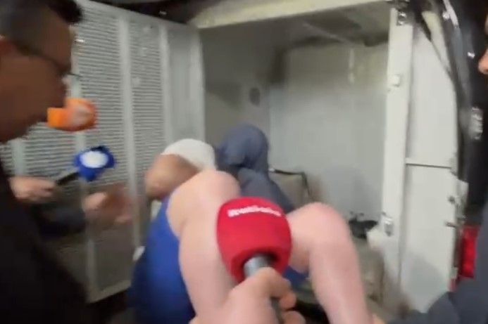Vídeo: algemado, empresário suspeito de matar gari em BH cobre o rosto e se cala