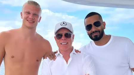 Erling Haaland ao lado de Tommy Hilfiger e Umar Kamani