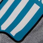 Racing muda escudo por ação de conscientização contra câncer nos testículos