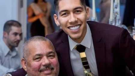 Firmino em foto ao lado do pai, José Roberto Cordeiro de Oliveira