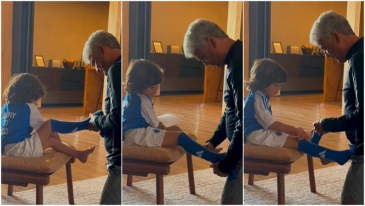 Bebeto veste neto com uniforme do Cruzeiro