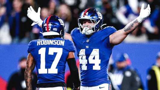 Cameron Skattebo e Wan'Dale Robinson celebram TD dos Giants sobre os Eagles