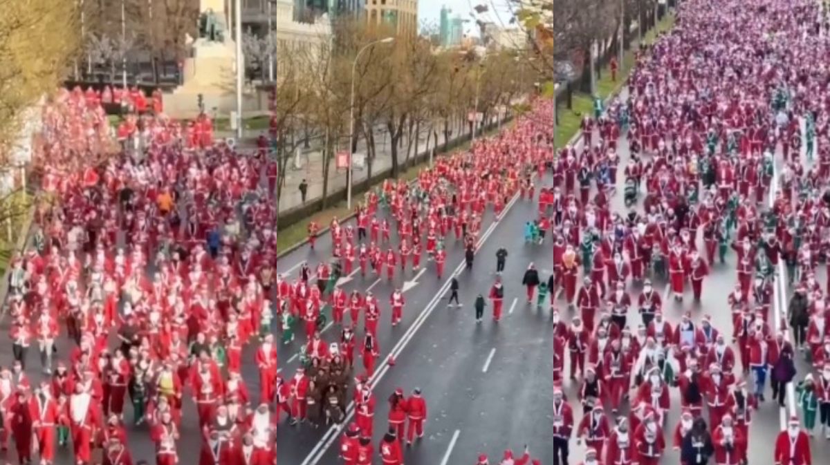 Corrida beneficente reúne milhares de 'Papais Noéis' em Madrid, na Espanha