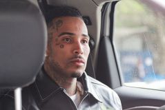 Fotos mostram Gato Preto chegando à delegacia