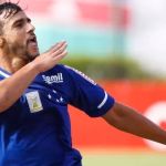 Como foi a primeira passagem de Henrique Dourado pelo Cruzeiro