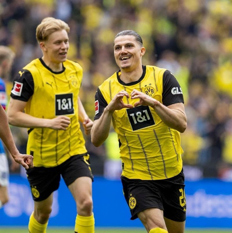 Dortmund vence rebaixado, conta com derrota de rival e fica com vaga na Champions