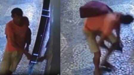 Imagem mostra suspeito 'pescando' roupas durante a madrugada