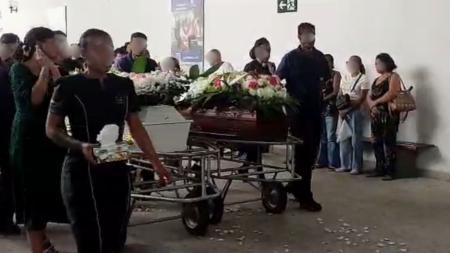 Mãe e filha mortas após queda de hotel são enterradas sob forte comoção