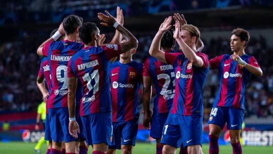 Jogadores do Barcelona durante jogo pela La Liga