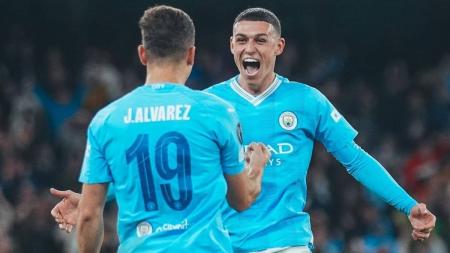Julian Álvarez e Phil Foden do Manchester City