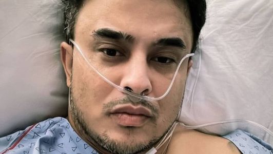 Kauan compartilhou uma foto na cama do hospital