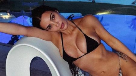 Kim Kardashian, empresária e estrela de reality show