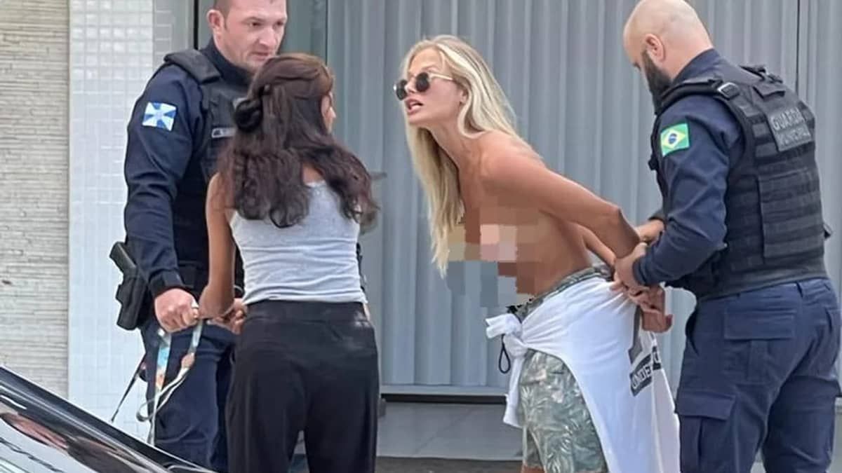 Mulher é detida após fazer topless para passear com cachorros em Balneário Camboriú