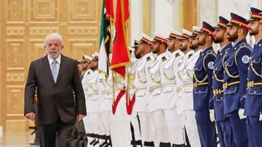 Lula em cerimônia oficial em Abu Dhabi, neste domingo (16)