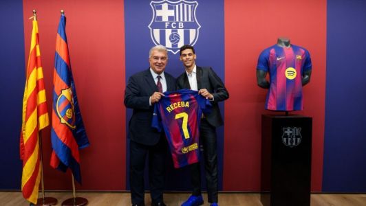 Joan Laporta, presidente do Barcelona, e Luva de Pedreiro, influencer brasileiro