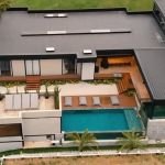 Boca Rosa compra mansão milionária com aquário de tubarões; veja fotos