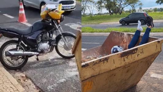 Vídeo: motociclista se distrai com sacola e vai parar dentro de caçamba no interior de Minas