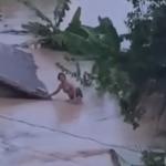 Vídeo: mulher sobe no telhado de casa durante inundação em MG e grita por socorro