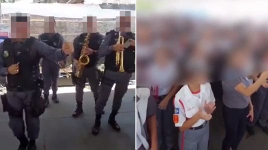 Foto mostra estudantes e músicos da banda da Polícia Militar do Mato Grosso