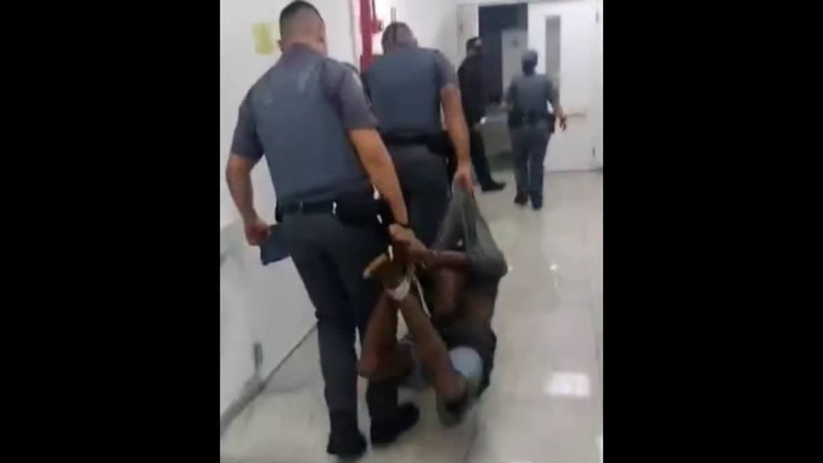 Homem negro é amarrado pelos pés e arrastado por policiais em São Paulo
