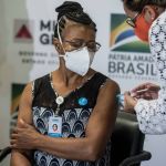 Primeira mineira foi vacinada contra a Covid-19 há dois anos: 'a ciência valeu a pena'