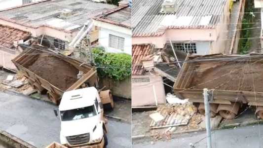 Vídeo: caminhão com 26 toneladas de minério perde controle e atinge casas na Grande BH