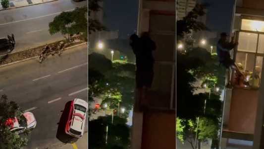 Vídeo: homem tenta invadir apartamentos, escala fachada e é resgatado no quinto andar em BH