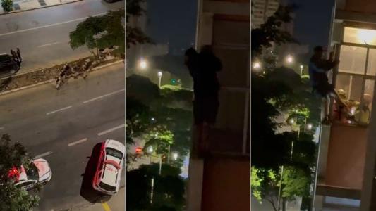 Vídeo: homem tenta invadir apartamentos, escala fachada e é resgatado no quinto andar em BH